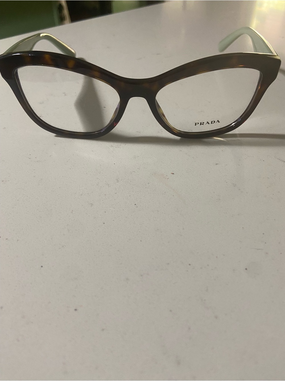 Prada Women’s Tortoiseshell Cat-Eye Glasses with Cream Temples